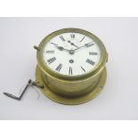 19th century bulk head clock, circular enamel Roman dial with subsidary seconds hand,