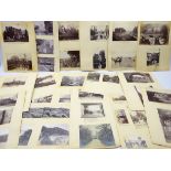 Over one hundred 19th century photographs mounted on loose card album leaves,