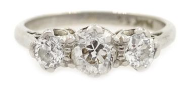 Platinum three stone old cut diamond ring,