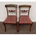 Pair of Regency brass inlaid rosewood dining chairs with striped drop in seats Condition