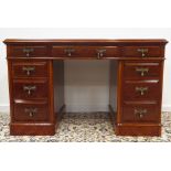 Late 19th century walnut twin pedestal desk, fitted with nine graduating drawers,