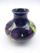 Moorcroft vase of squat form decorated in the yellow and purple Pansy pattern, type 32,