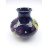 Moorcroft vase of squat form decorated in the yellow and purple Pansy pattern, type 32,