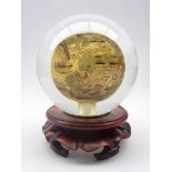 Chinese reverse printed glass sphere on hardwood stand with box,