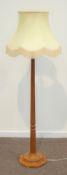 'Mouseman' oak standard lamp, adzed octagonal column on stepped octagonal base,