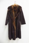 Vintage full length fur lined brown coat with waist belt