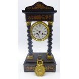 Late 19th century French ebonised portico clock, four barley twist supports,