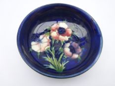 Moorcroft footed bowl decorated in the Anemone pattern, impressed Potter to H.