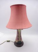 Moorcroft table lamp decorated in the Foxglove pattern, designed by Rachel Bishop,