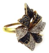9ct gold (tested) white and black diamond flower design ring Condition Report & Further