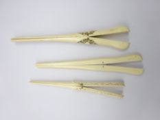 Two pairs of Chinese ivory glove stretchers both with carved detail and a Victorian ivory pair of
