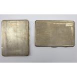 Two engine turned silver cigarette cases by I S Greenberg & Co, Birmingham 1933 and 1939,