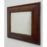 18th century figured walnut cushion framed mirror,