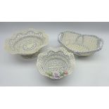 Set of three porcelain basket-weave bowls comprising footed bowl, two handled oblong basket,