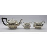 Silver three piece tea set by Charles Boyton & Son, London 1918,