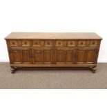 20th century medium oak four drawer linen fold dresser base sideboard, fitted with ironwork handles,