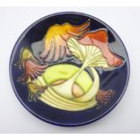 Moorcroft 'Parasol Dance' pattern coaster designed by Kerry Goodwin, 2005, D12cm,