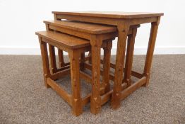 'Mouseman' adzed oak rectangular nest of three tables, octagonal legs with stretcher bases,