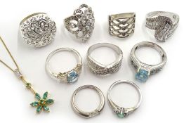 Silver-gilt green stone set flower pendant, similar earrings, blue stone set rings,