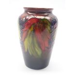 Moorcroft Flambe Leaf & Berry vase c1930 of tapered ovoid form, impressed marks, 'Potter to H.