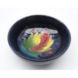 Moorcroft small footed dish in the Leaf and Berries pattern,