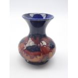 1920s Moorcroft 'Big Poppy' pattern vase of baluster form with flared rim,