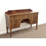 Early 20th century inlaid mahogany sideboard, short raised back above crossbanded rectangular top,