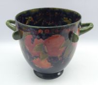 Moorcroft two handled jardiniere decorated in the fruit and berries pattern with applied lappets,
