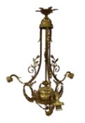 Empire style gilt metal three branch electrolier cast with floral garlands, wreaths and scrolls,
