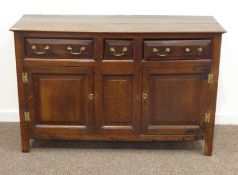 Early 18th century country oak dresser, three drawers and two fielded panelled cupboard doors,