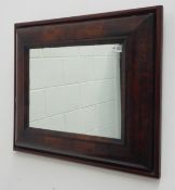 Early 18th century figured walnut cushion framed mirror, rectangular form with later plate,