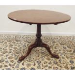 19th century mahogany circular pedestal table, circular folding top, turned base with three legs,