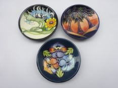 Three Moorcroft Collectors Club coasters - 'Triple Choice' & 'New Forest' both designed by Rachel