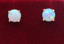 Pair of silver opal stud earrings,