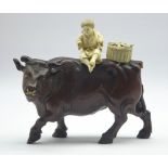 Late 19th century Japanese carved wood figure of a Buffalo with an ivory figure of a child seated