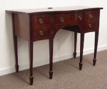Early 19th century mahogany serpentine sideboard, centre drawer flanked by deep drawer and cupboard,