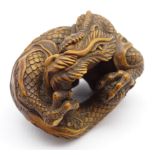 Japanese carved wood netsuke in the form of a dragon with 'Masanao' signature W4cms