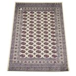 Persian Bokhara design ivory ground rug/wall hanging,