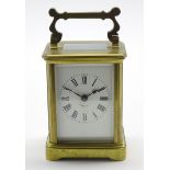 Miniature early 20th century carriage clock time-piece, brass and glazed case with Roman dial,