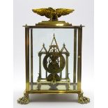 Late 19th century Gothic skeleton clock in brass and bevelled glass case,