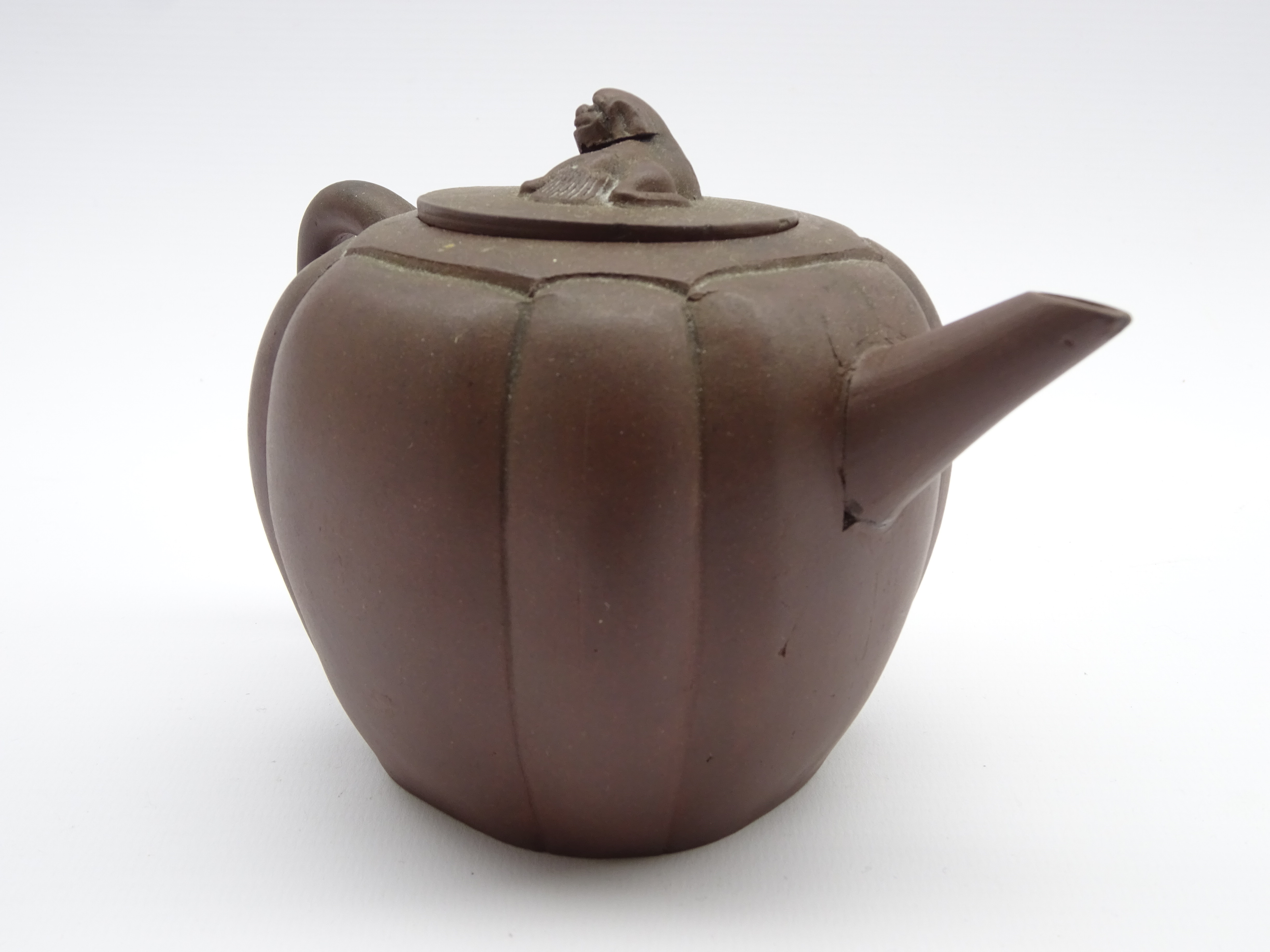 Chinese terracotta teapot of circular design with Dog of Fo lift and loop handle H11cms - Image 3 of 3