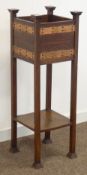 Early 20th century Arts & Crafts oak plant stand, studded copper straps,
