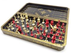 Late 19th Century Chinese Export lacquered folding games board the exterior painted in gilt with