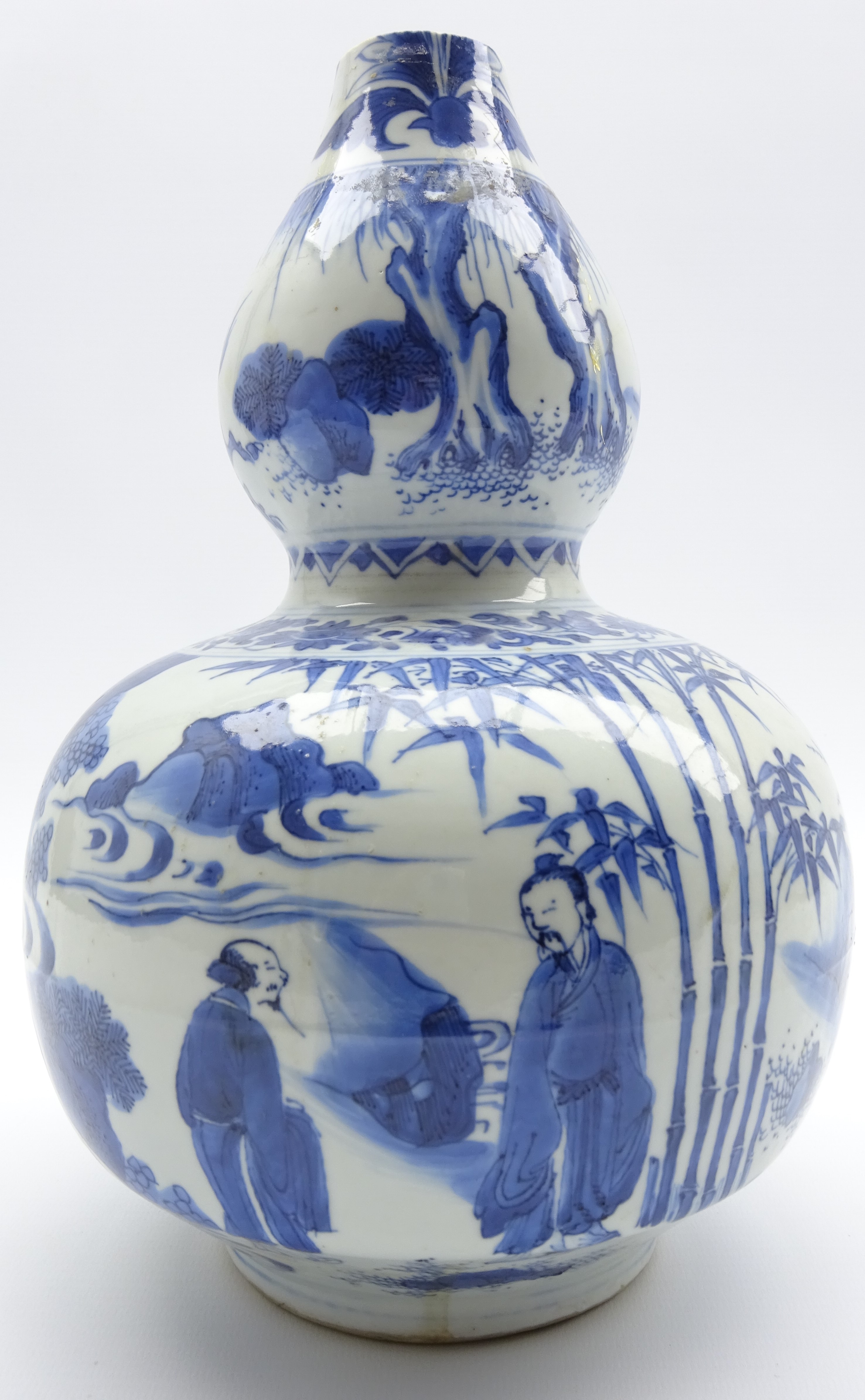 17th Century Chinese gourd shape vase decorated with a hunter chasing a stag,