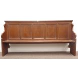 Possibly 'Mouseman' - 20th century oak church pew, five panelled back, shaped moulded end supports,