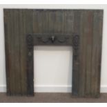 Georgian Adams style applied metal fire insert, frieze with moulded rams head and floral garlands,
