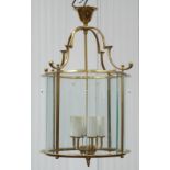 Gilt metal four branch entrance hallway lantern, cylindrical form with eight bevelled glass panels,