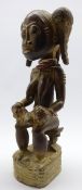 African Baule carved wood maternity group of a mother and child H43cms
