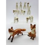 Beswick model of a seated fox No.1748, a standing fox No.