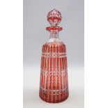 Red overlay glass decanter and stopper of ribbed cylindrical design H30cms Condition